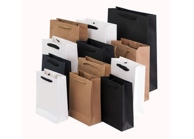 Sacs de magasinage en papier revêtus sur mesure Sac de magasinage en papier pliable de luxe avec poignée Sac de magasinage en papier blanc