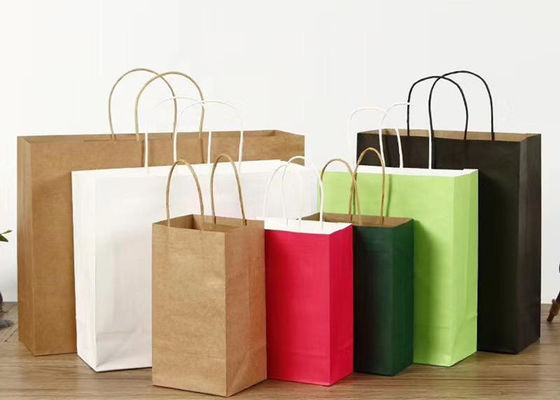 Sacs de magasinage en papier revêtus sur mesure Sac de magasinage en papier pliable de luxe avec poignée Sac de magasinage en papier blanc